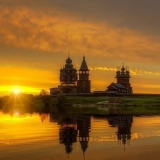 Закат на Онежском озере. Вид на архитектурный ансамбль Кижи